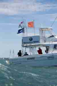 Start boat Etchells Part of the gang busy volunteering.