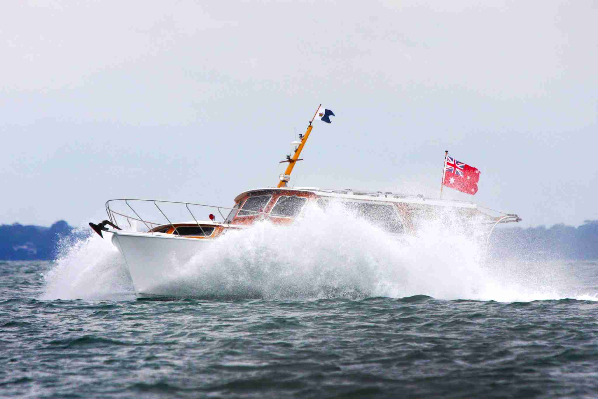Navigational Yacht on Moreton Bay punching through waves